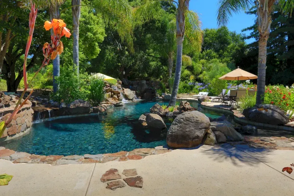 Custom residential swimming pool built by Royal Pools by Adams