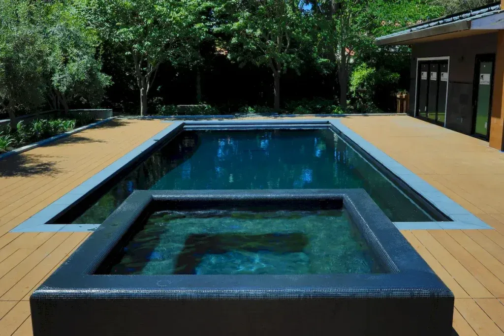 Custom residential swimming pool and spa built by Royal Pools by Adams